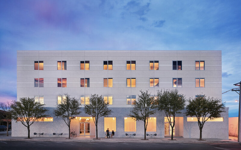 Hotel Saint George at dusk, windows lit